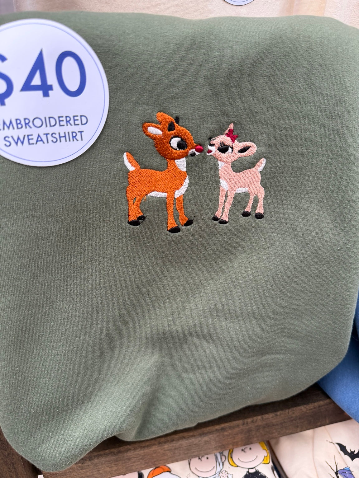 Rudolph and Clarice embroidered sage-green fleece sweatshirt