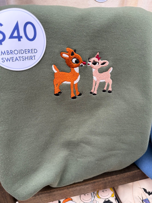 Rudolph and Clarice embroidered sage-green fleece sweatshirt